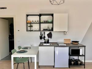 Η κουζίνα ή μικρή κουζίνα στο Business Suite nel Cuore di Arzignano - Eleganza e Funzionalità