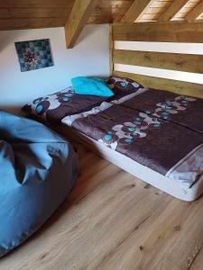 Postel nebo postele na pokoji v ubytování Apartmány Máchovo jezero