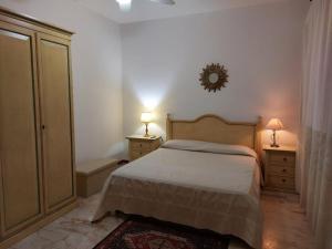 Ένα ή περισσότερα κρεβάτια σε δωμάτιο στο CASA Frau