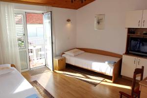 Postel nebo postele na pokoji v ubytování Apartments J&R Babara