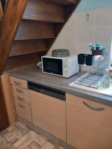 Una cocina o zona de cocina en Demeure de la Vieille Tour