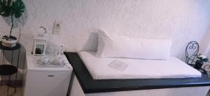 Llit o llits en una habitació de Lassithi Plateau Traditional Hotel Maria