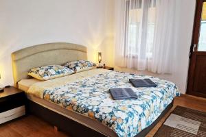 Postel nebo postele na pokoji v ubytování ViPo Vista Veliko Tarnovo