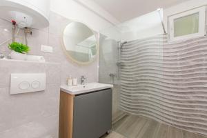 Kúpeľňa v ubytovaní Apartment Petea + 37 fotografií