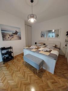 Postel nebo postele na pokoji v ubytování SOBE ŠOTIĆ