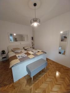 Postel nebo postele na pokoji v ubytování SOBE ŠOTIĆ