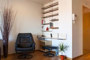 Posezení v ubytování Apartment familiar