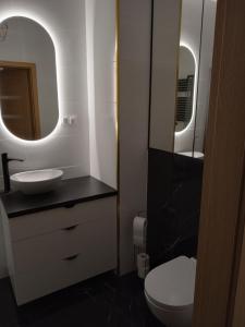Koupelna v ubytování Apartament Tykocin