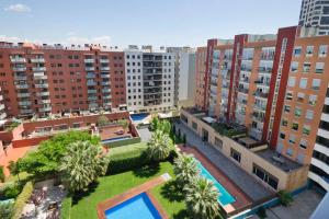 Bazén v ubytování Apartment familiar nebo v jeho okolí