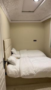 Giường trong phòng chung tại فندق منيف بن طالب