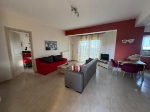 Posezení v ubytování Aristos Apartments & Suites