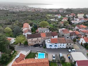 an aerial view of a small town with houses at Villa Fran, Krk in Sveti Vid-Miholjice