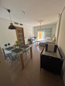 Кровать или кровати в номере Apartamento cerca Playa de Aguadulce