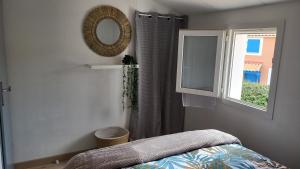 Postel nebo postele na pokoji v ubytování Les bastides de la plage-400 m de la plage
