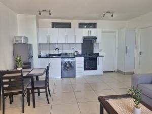 Kuchyň nebo kuchyňský kout v ubytování City Junction Windhoek Self Catering