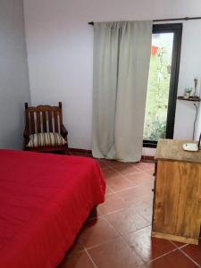 Llit o llits en una habitació de Casa Hermosa, La Punta San Luis