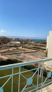 a view of a field from a balcony at RIVERA"For Family" in Ras Sedr