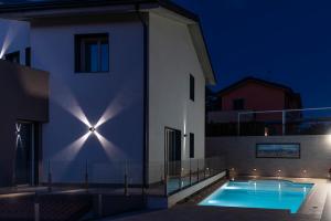 Bazén v ubytování Gigli Rooms nebo v jeho okolí