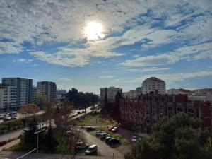 a view of a city with cars parked on a street at Bar Central Point - 2BR Apartment in Bar