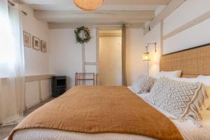 Posteľ alebo postele v izbe v ubytovaní Le Cottage de Chitenay