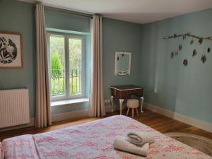 Posteľ alebo postele v izbe v ubytovaní Chambre d'hôtes LE FLACON DE LA VERROUILLE