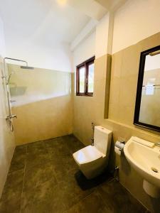 Kylpyhuone majoituspaikassa New Cinnoman Villa