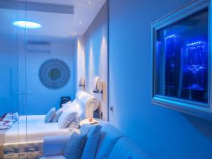 A bed or beds in a room at Navona Living Rome