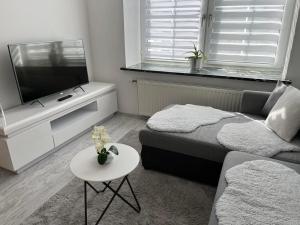 TV a/nebo společenská místnost v ubytování Charmantes Ferienhaus - Velden
