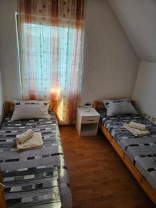 A bed or beds in a room at Villa Nesh