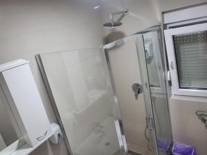 Vonios kambarys apgyvendinimo įstaigoje Mango Apartments