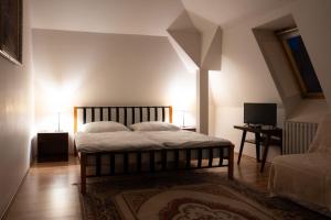 Кровать или кровати в номере Arco penzion