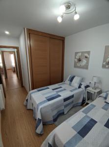 Postel nebo postele na pokoji v ubytování APARTAMENTO A CHILENA