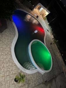 an overhead view of a pool of water with a traffic light at Yobcar66 in San Fernando de Monte Cristi