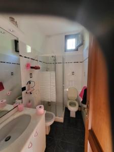 a bathroom with a sink and a toilet and a shower at Villa ANGEL in Rapallo +39 photos
