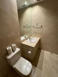 Um banheiro em Hotelly Atocha