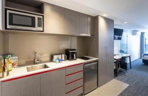 Kuchyň nebo kuchyňský kout v ubytování Corporate Living Accommodation Abbotsford