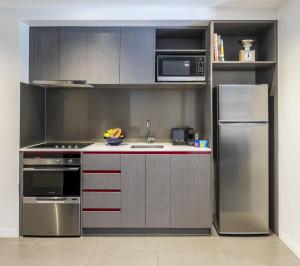 Kuchyň nebo kuchyňský kout v ubytování Corporate Living Accommodation Abbotsford