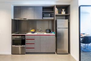 Kuchyň nebo kuchyňský kout v ubytování Corporate Living Accommodation Abbotsford