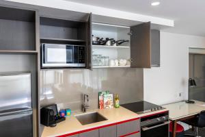 Kuchyň nebo kuchyňský kout v ubytování Corporate Living Accommodation Abbotsford