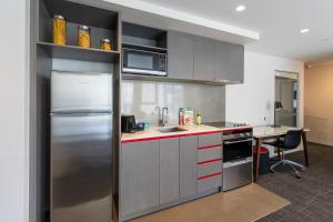 Kuchyň nebo kuchyňský kout v ubytování Corporate Living Accommodation Abbotsford
