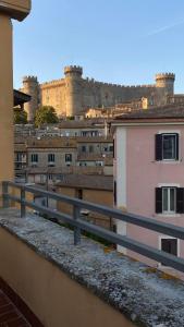 a view of a city from a balcony at Casa Silvia in Bracciano