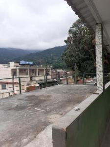 an empty parking lot in front of a building at Apartamento em Muriqui/RJ - apt 203 in Mangaratiba