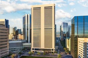 a tall building in the middle of a city at The Ritz-Carlton, Denver in Denver