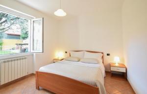 Katil atau katil-katil dalam bilik di 1 Bedroom Lovely Apartment In Domaso