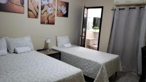 Ένα ή περισσότερα κρεβάτια σε δωμάτιο στο Casa Altamira