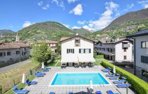 an aerial view of a villa with a swimming pool at 1 Bedroom Beautiful Apartment In Domaso in Domaso +17 photos