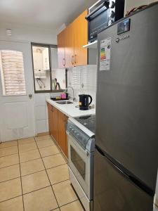 Η κουζίνα ή μικρή κουζίνα στο Departamento Puertas del Mar