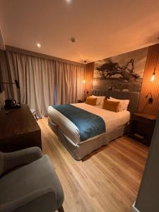 Cama ou camas em um quarto em Alto Andino Hotel