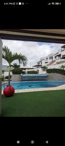 Πισίνα στο ή κοντά στο Departamento en montecristi golf club