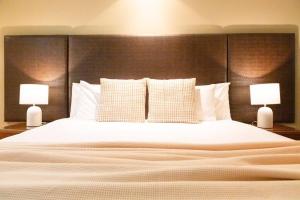 Katil atau katil-katil dalam bilik di 'Harbour Highlight' Poolside Living on Esplanade